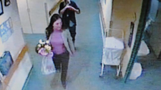 CCTV footage from the day Glenys Heyward went missing in 2007. She’s shown here with flowers in hand at the Mount Gambier Hospital where she went to visit her mother. (Pic: Supplied)