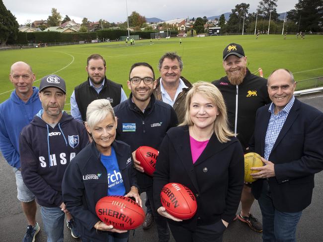 Elise Archer MP, front left, with candidates and representatives from local sporting bodies that use the Queenborough Oval at Saturday’s funding pledge. Picture: Chris Kidd