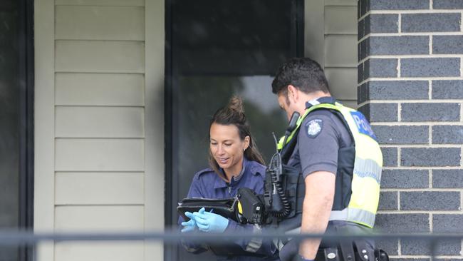 Police at the scene of a suspicious house fire in Norlane. Picture: Peter Ristevski