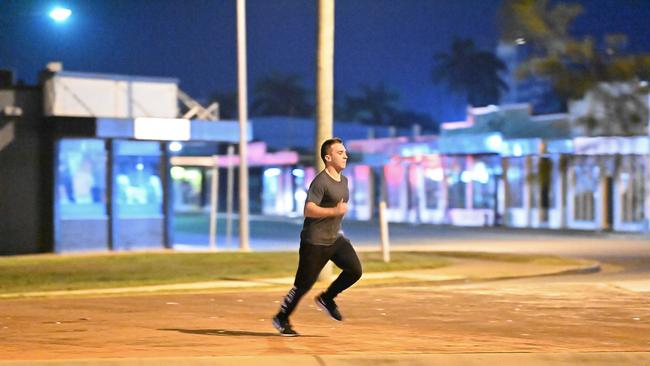 Isaac Irons reenacts the alleged killer’s sprint towards Shandee Blackburn, which was captured on CCTV. Picture: Lyndon Mechielsen