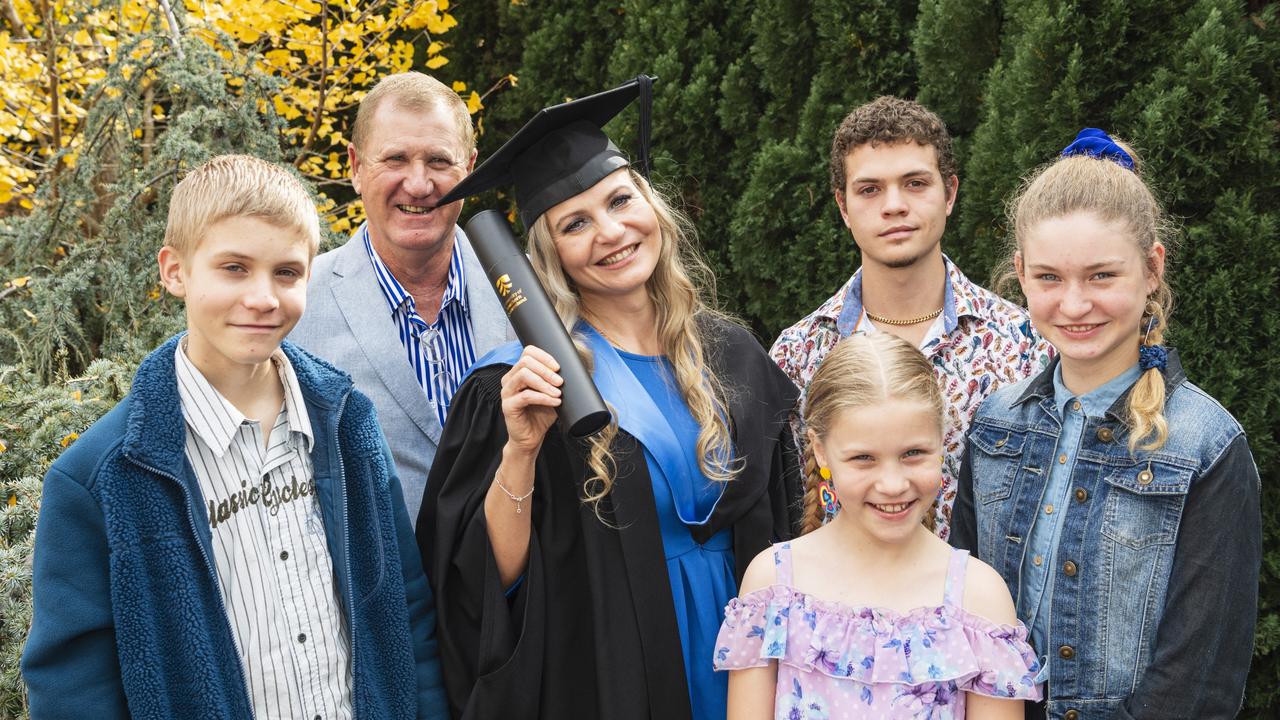 Bachelor of Nursing and Midwifery graduate Anna Kroehn with (from left) Lincoln Kroehn, Mat Kroehn, Krystelle Kroehn, Eduard Lenktis and Maria Kroehn at a UniSQ graduation ceremony at The Empire, Tuesday, June 25, 2024. Picture: Kevin Farmer