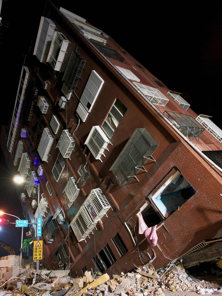 A building is left slanted following the earthquake. Picture: Sam Yeh/AFP