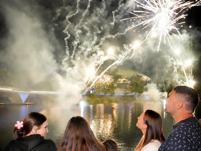 People gathering in Elder Park, ready for the fireworks. Craig and Danielle Pope and their kids, Katie,18, Ellie,15, and Rory,8, live at Munno Para, after having moved from Somerset in the UK 18 months ago. It was their first New YearÃs fireworks display at Elder Park. 31 December 2024. Picture Dean Martin