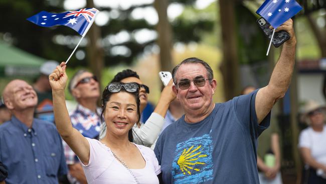 Joanne Liang and Stephen Kelly as the giant flag is raised at Toowoomba Australia Day celebrations at Picnic Point, Sunday, January 26, 2025. Picture: Kevin Farmer