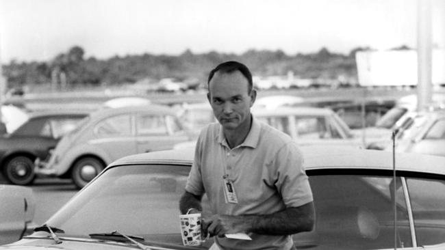 Apollo 11 astronaut Michael Collins carries his coffee as he arrives at the flight crew training building of the NASA Kennedy Space Center in Florida, on July 8, 1969, one week before the nation’s first lunar landing mission. Picture: Michael Ochs Archives/GettyImages)