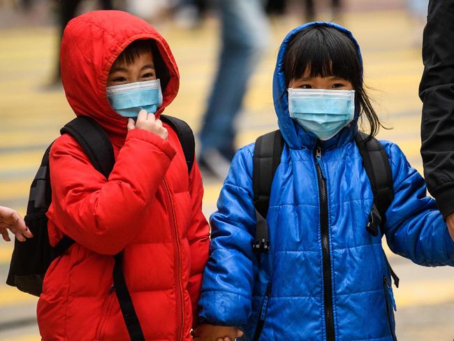 Children in Hong Kong. Picture: Anthony Wallace/AFP