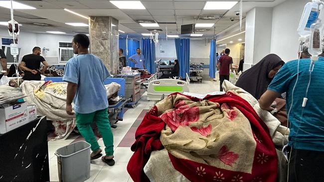 Inside the al-Shifa Hospital as heavy fight rages nearby. Picture: AFP