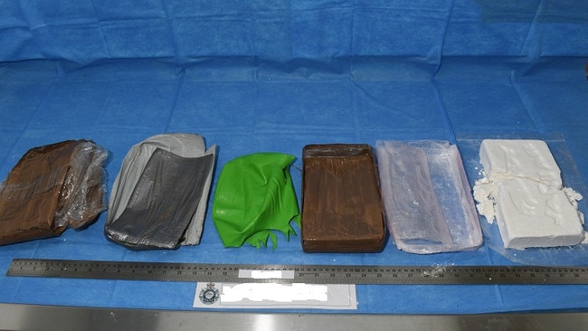 Some of the packages found in the safe that contained cocaine.