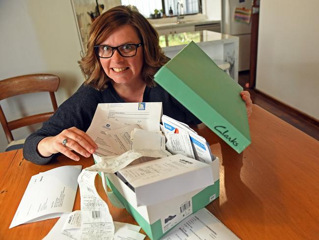 19/06/18 - Heather Gill at her Somerton Park home with her shoebox for of tax receipts. Picture: Tom Huntley