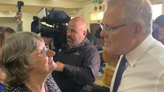 Prime Minister Scott Morrison meets Sarsfield resident Lynette Wallwork who lost her home in the bushfires. Picture: Brianna Travers