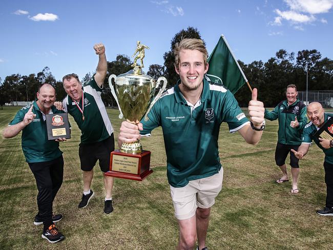 Steve Hancock club president, Mino Pellizzon head coach, Ben Myers captain,  Kevin Myers goal keeper coach and Enrico Petroni reserve coach posing at Quakers Hill Park in Quakers Hill NSW, Australia. 29 September, 2018. Quakers Hill Junior Soccer Club has taken out both the Premier League and Reserve Premier League championships in the Blacktown District Soccer Football Association.  (AAP IMAGE / Carmela Roche).