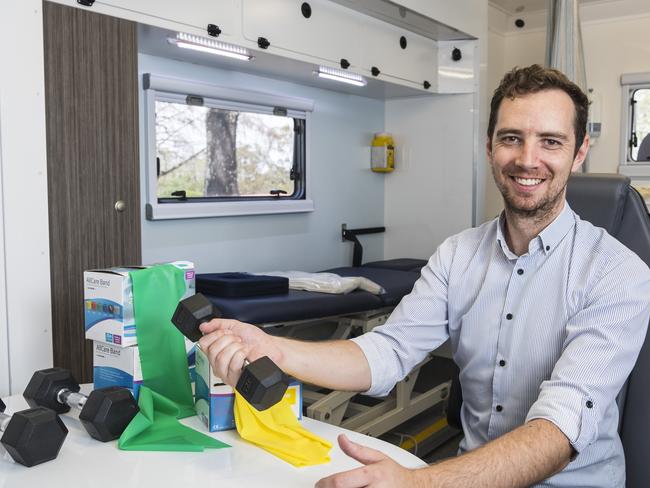 Better Movement Clinic director John Dennehy inside the mobile health clinic van the Toowoomba allied health provider is using to service rural areas, Tuesday, February 9, 2021. Picture: Kevin Farmer