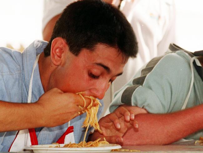 Ingham Australian / Italian Festival. Doing battle in the spaghetti eating competition are (L) David Crisafulli (winner), & (R) Paul Cosentino taken in 1999. Picture: Scott Radford