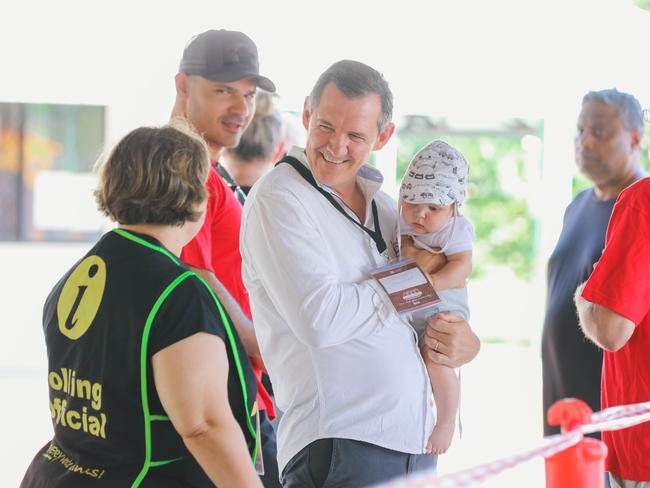 Chief Minister Michael Gunner and son Hudson arrive at Parap Primary School polling booth in the Fannie Bay electorate on Saturday. Picture GLENN CAMPBELL