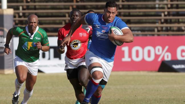 Namibia centre Darryl de la Harpe on the attack against Kenya.