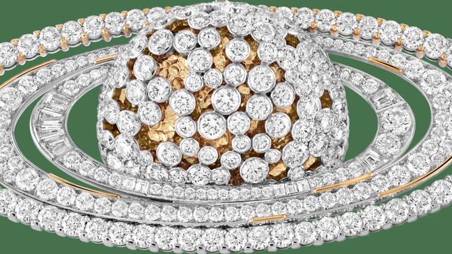 Saturne clip by Van Cleef & Arpels