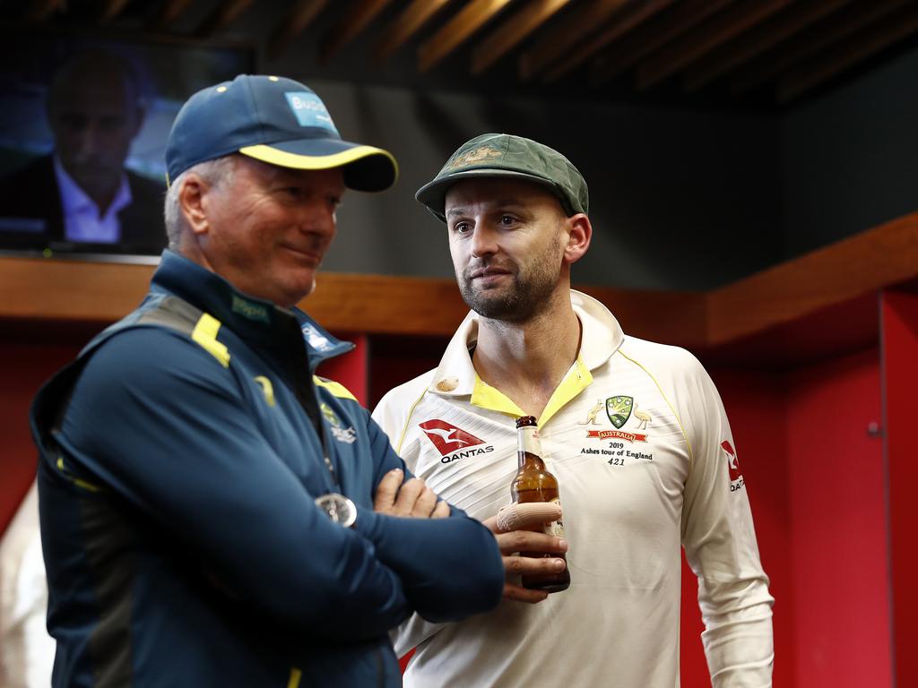 MANCHESTER, ENGLAND - SEPTEMBER 08: Nathan Lyon of Australia and Steve Waugh, Australian Team Mentor, celebrate in the change rooms after Australia claimed victory to retain the Ashes during day five of the 4th Specsavers Test between England and Australia at Old Trafford on September 08, 2019 in Manchester, England. (Photo by Ryan Pierse/Getty Images)