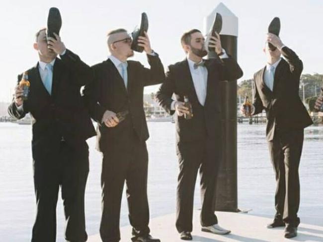 Jordan Wilson, second from right, does a ‘shoey’ with fellow wedding guests. Picture: Facebook 