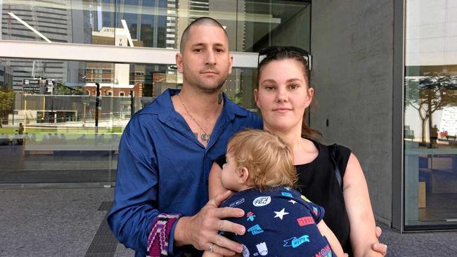 RECOVERED: Gympie father Timothy Udris, who survived a hammer attack in June, 2014, outside Brisbane Supreme Court with his wife Emily. Picture: Jessica Grewal