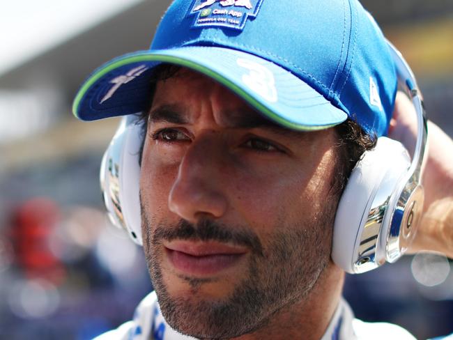 SUZUKA, JAPAN - APRIL 07: Daniel Ricciardo of Australia and Visa Cash App RB prepares to drive on the grid prior to the F1 Grand Prix of Japan at Suzuka International Racing Course on April 07, 2024 in Suzuka, Japan. (Photo by Peter Fox/Getty Images)