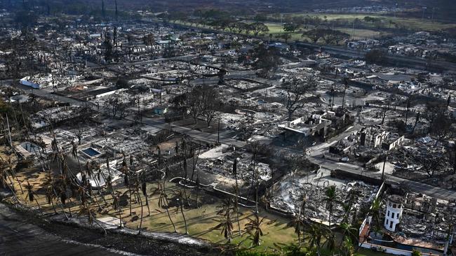 The fires ripped through the holiday resort, putting thousands of lives at risk. Picture: Patrick T. Fallon / AFP.