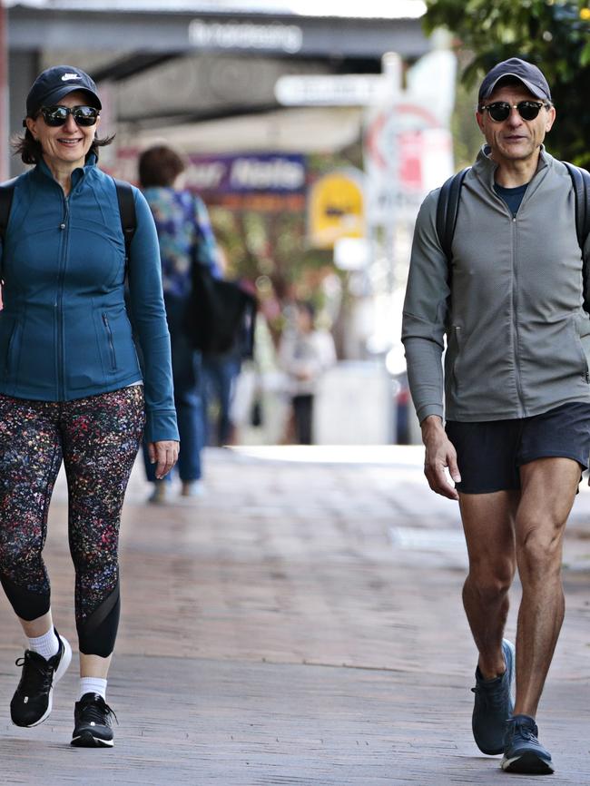 Gladys Berejiklian takes a walk with her partner, lawyer Arthur Moses. Picture: Adam Yip