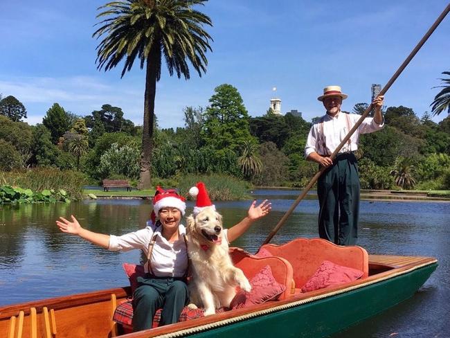 Punting on the Lake business owners Ayami and Wesley Golledge with dog Fergus. Picture: @puntingonthelake