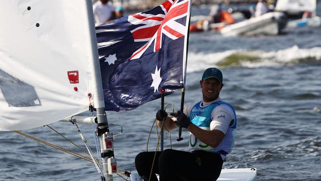 Tom Burton of Australia celebrates winning the gold medal in the Men's Laser class in Rio.