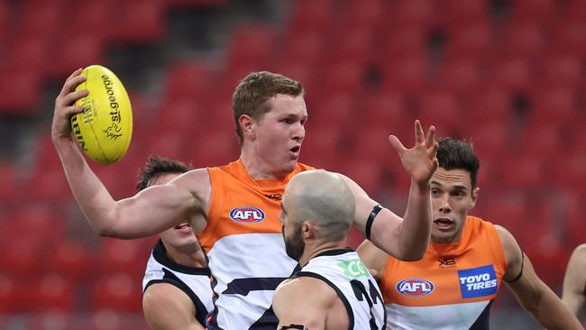 Tom Green stands tall in a pack during the Giants’ victory over Collingwood.