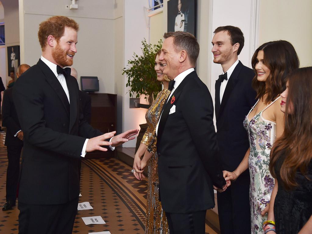 Prince Harry meets the cast and crew of the new James Bond 007 film ‘Spectre’ before the world premiere. Picture: Reuters