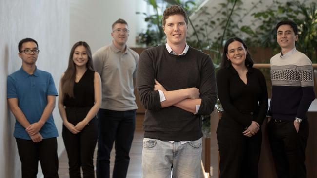 NAB senior consultant engineer Brenton Walker (front) with interns (from left) Daniel Ho, Peggy Yu, Daniel Bound, Olivia Bryan and Alex Qiang. Picture: Arsineh Houspian