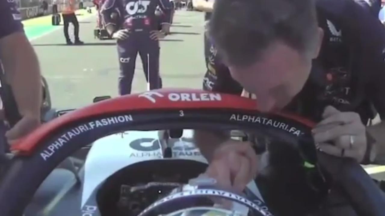 Christian Horner shakes Daniel Ricciardo's hand before the Hungarian Grand Prix.