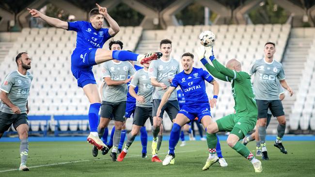 Harrison Sawyer scores a goal for South Melbourne. Picture: Luke Radziminski