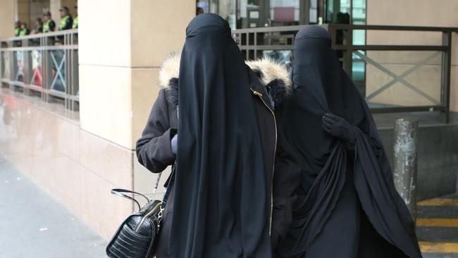 Supporters of the accused leave the Melbourne Magistrate Court in Melbourne. Picture: AAP