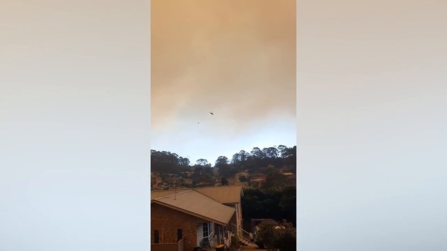 RAW: Firefighting helicopters fly over Catalina blaze