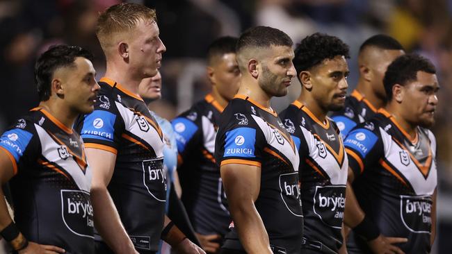 WOLLONGONG, AUSTRALIA - JUNE 07:  Wests Tigers players look on after a Dragons try during the round 14 NRL match between St George Illawarra Dragons and Wests Tigers at WIN Stadium on June 07, 2024, in Wollongong, Australia. (Photo by Jason McCawley/Getty Images)