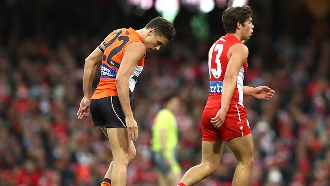 Josh Kelly reacts after injuring his knee. (Photo by Ryan Pierse/Getty Images)
