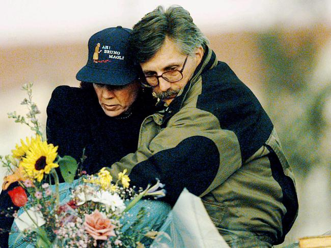 Fred Goldman and wife Patti sit at grave of their son Ron in Valley Oaks Memorial Park in California, in February 1997.