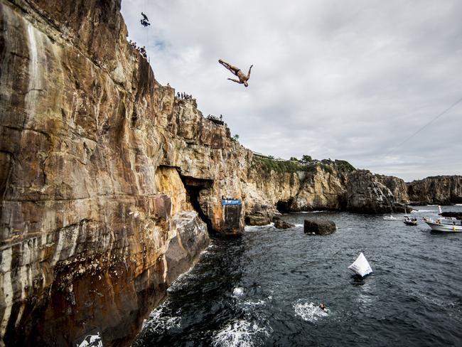 Michal Navratil of the Czech Republic dives from the 28 metre platform during the eighth stop of the Red Bull Cliff Diving World Series, Shirahama, Japan. Picture: Dean Treml/Red Bull via Getty Images