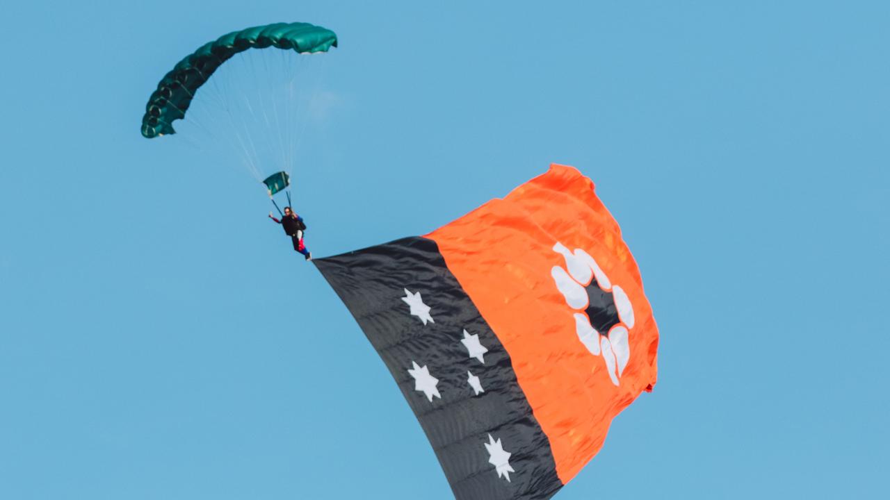 Skydivers descend before Gary Clarke trained Ã&#146; Playoffs Ã&#146; scores an emotional win in the Great Northern Darwin Cup. Picture: Glenn Campbell