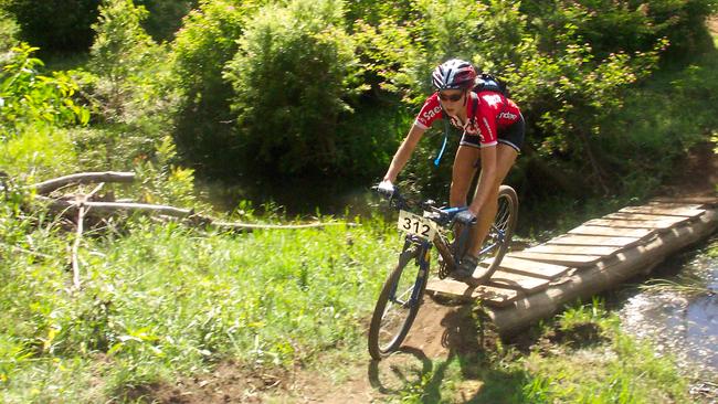 Erin McNaught competing on her mountain bike. Picture:Chic Model Management. 