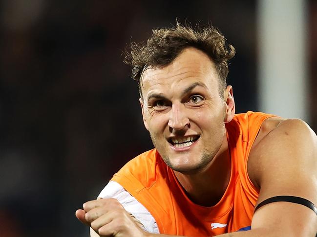 CANBERRA, AUSTRALIA - MAY 07: Braydon Preuss of the Giants passes during the round eight AFL match between the Greater Western Sydney Giants and the Geelong Cats at Manuka Oval on May 07, 2022 in Canberra, Australia. (Photo by Mark Kolbe/Getty Images)