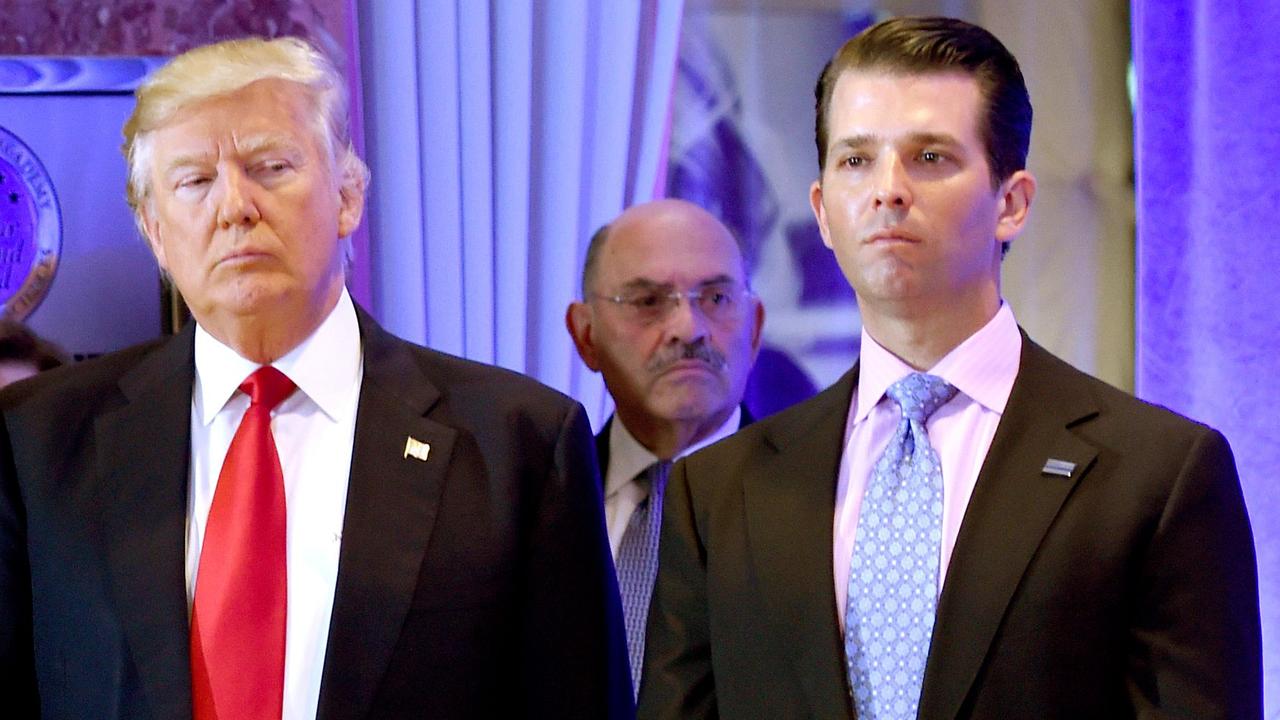 The former US president with his eldest son at Trump Tower. Picture: Timothy A Clary/AFP