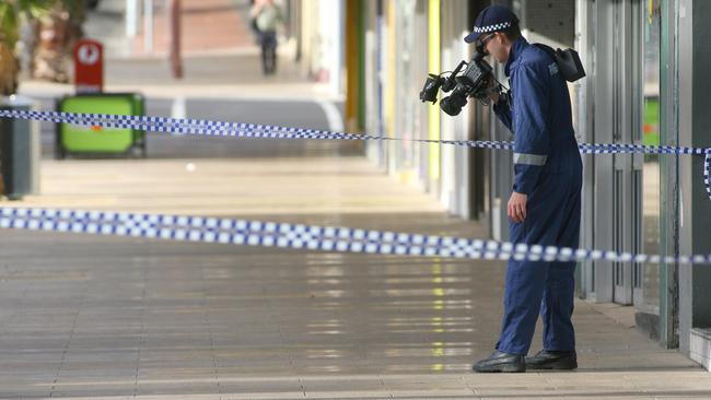 Forensic police near the scene of the rape in 2006. The victim wants to see more done to offer support to victims of crime upon the release of violent offenders.