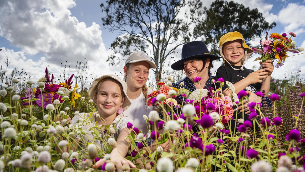 Kacee Murray with her nieces and nephews Violet (left), Autumn and Theo Murray in the blooms as Karinya in the Valley host a pick your own flower session. Picture: Kevin Farmer