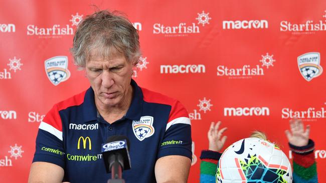 Adelaide United coach Gertjan Verbeek at a press conference with daughter Senne at Coopers Stadium in September. (AAP Image/David Mariuz)