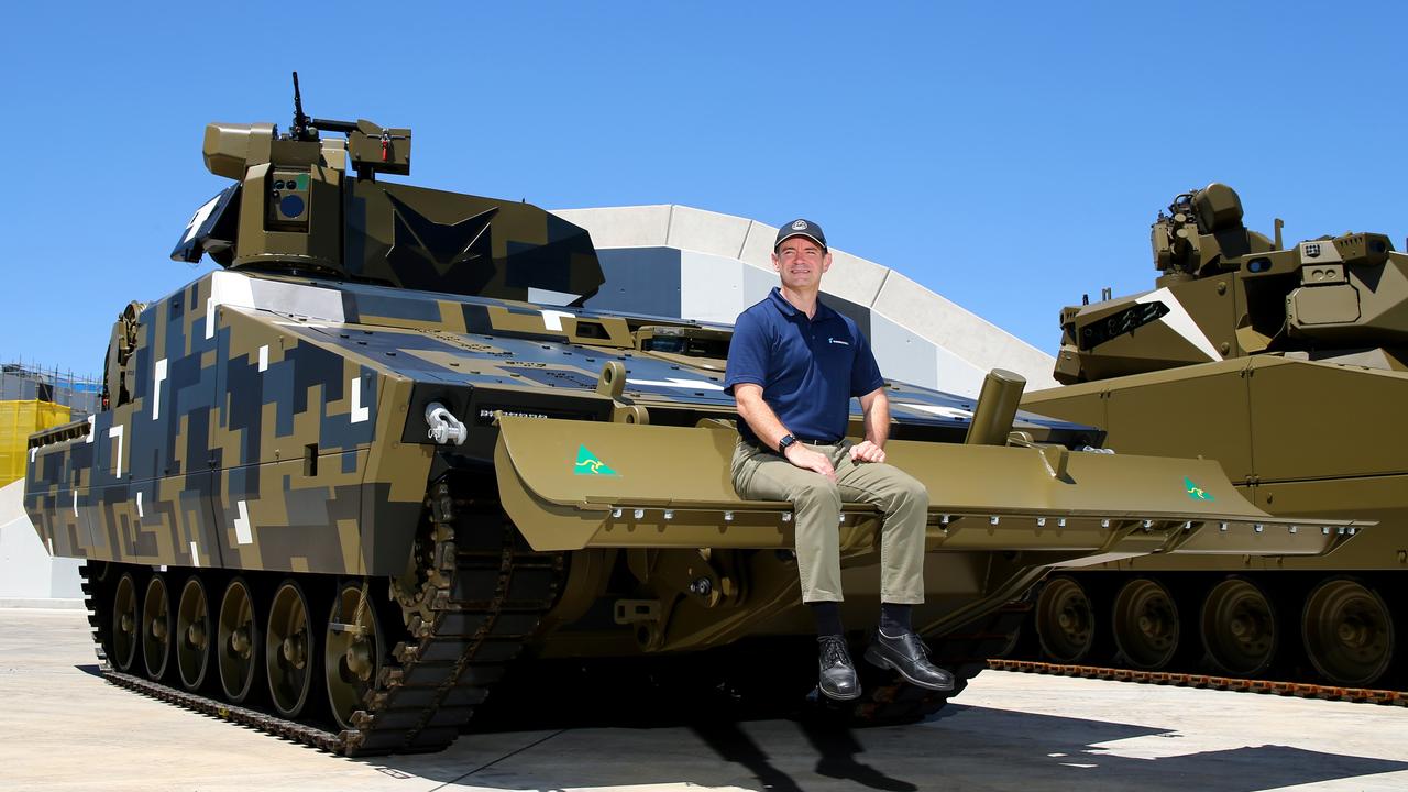 Rheinmetall Defence Australia Managing Director Gary Stewart pictured with the company’s newest combat support vehicle