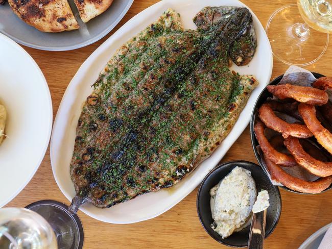 The Butterflied Rainbow Trout with onions rings at Cirrus. Picture: Jenifer Jagielski