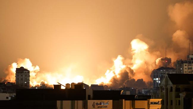 Buildings in Gaza City burn during an Israeli air strike. Picture: AFP