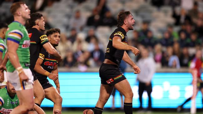 Jaeman Salmon screams “weak-gutted dog” after scoring against Canberra. Picture: Mark Kolbe/Getty